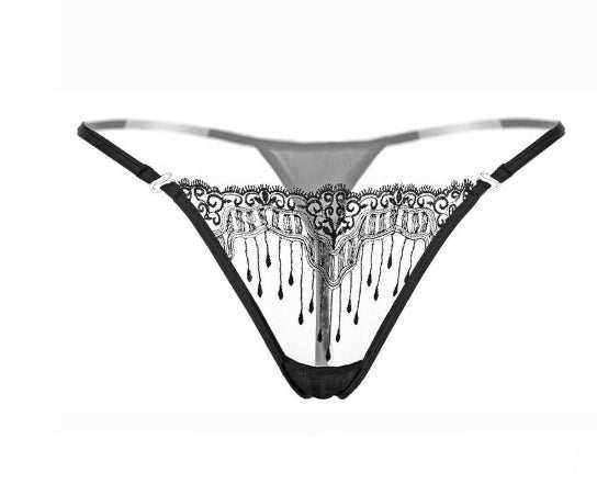 Tanga de encaje sexy negra y blanca, con paneles de encaje floral, detalles colgantes y tiras ajustables.