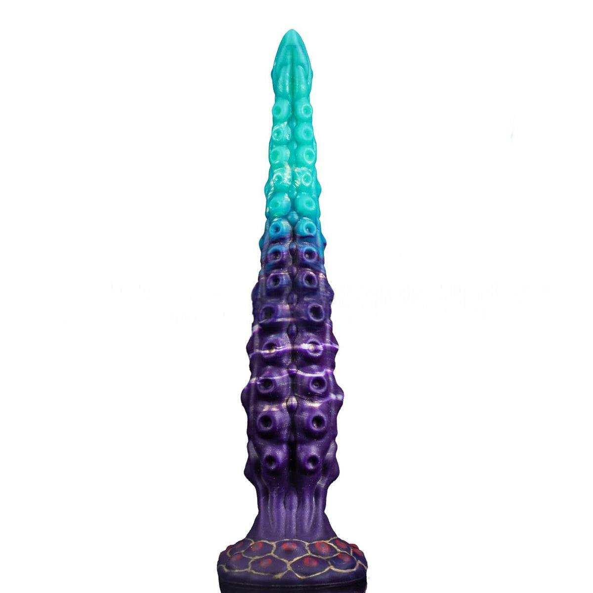 Estimulador Íntimo Extralargo con diseño texturizado de relieves circulares y degradado turquesa a morado brillante.