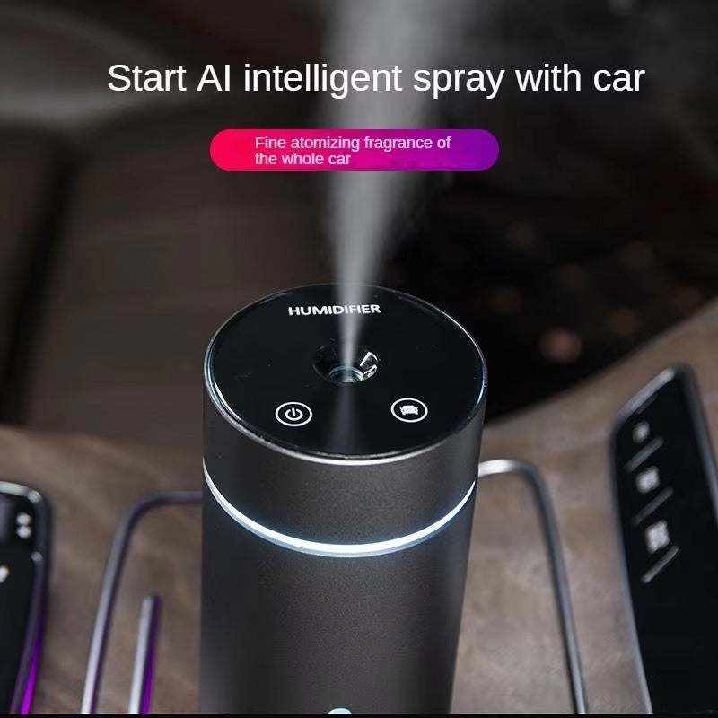 humidificador portátil para coche negro de cuerpo cilíndrico, con acabado metálico, controles superiores y aro luminoso blanco
