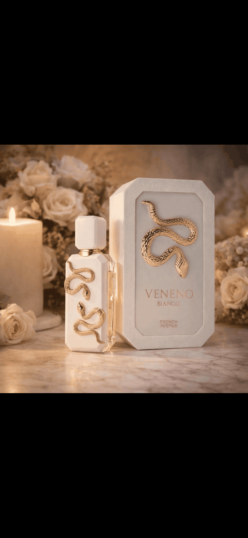 Veneno Blanco Eau de Parfum en frasco y estuche color marfil, con detalles dorados en relieve y diseño de serpiente.
