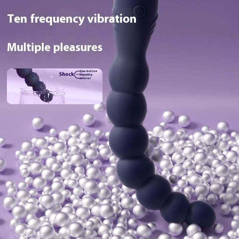 Vibrador de perlas Anales negro, alargado y flexible, con cuentas esféricas unidas y botón de control integrado.