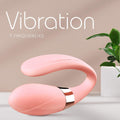 Vibrador para Parejas de silicona rosa con diseño curvo y banda metálica brillante, con dos extremos redondeados.